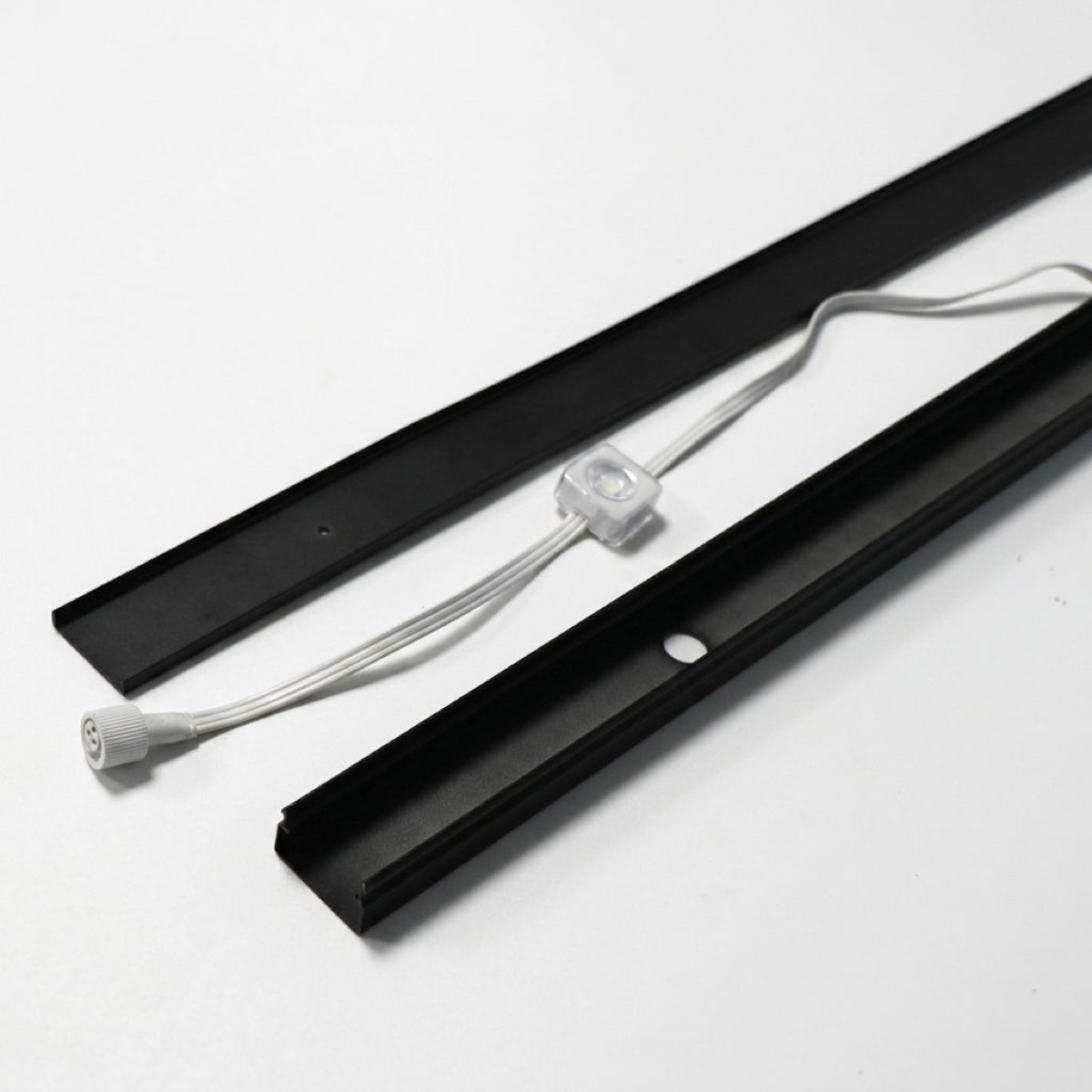 SnapTrack two-piece aluminum channel in Black with Govee light puck and connector