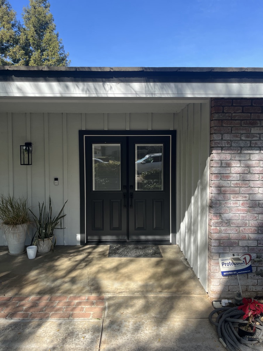 Aluminum channel color-matched to the fascia, nearly invisible in daylight