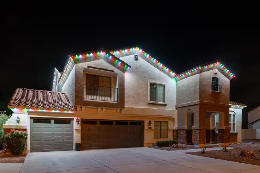 Strata lighting on a stone and stucco home