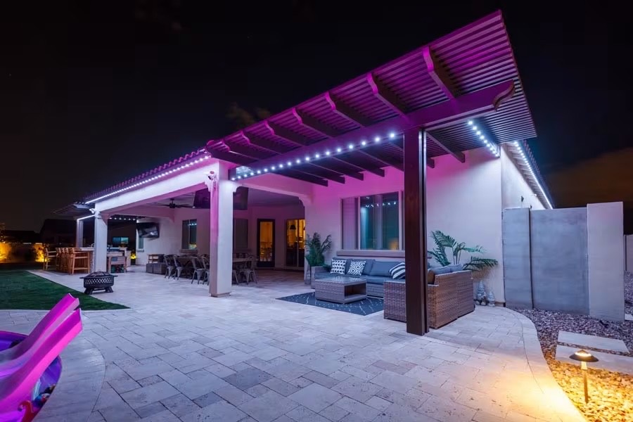 Full-color Strata lighting during a backyard party