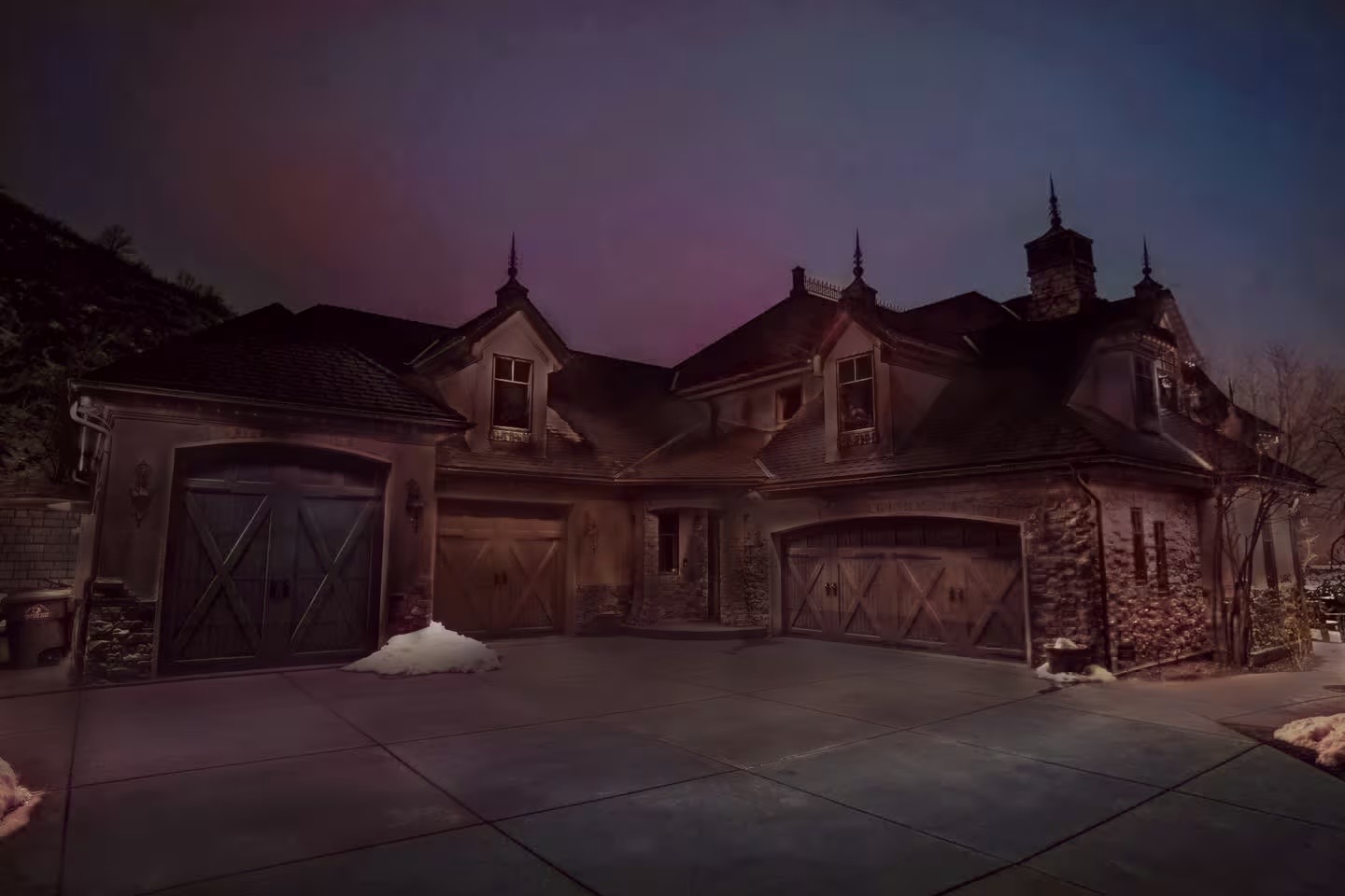 The same home at dusk before Strata permanent lighting was installed