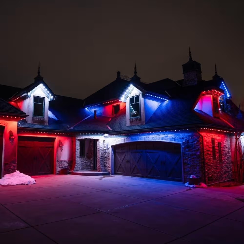 Strata lighting tracing the gables of a Colorado home